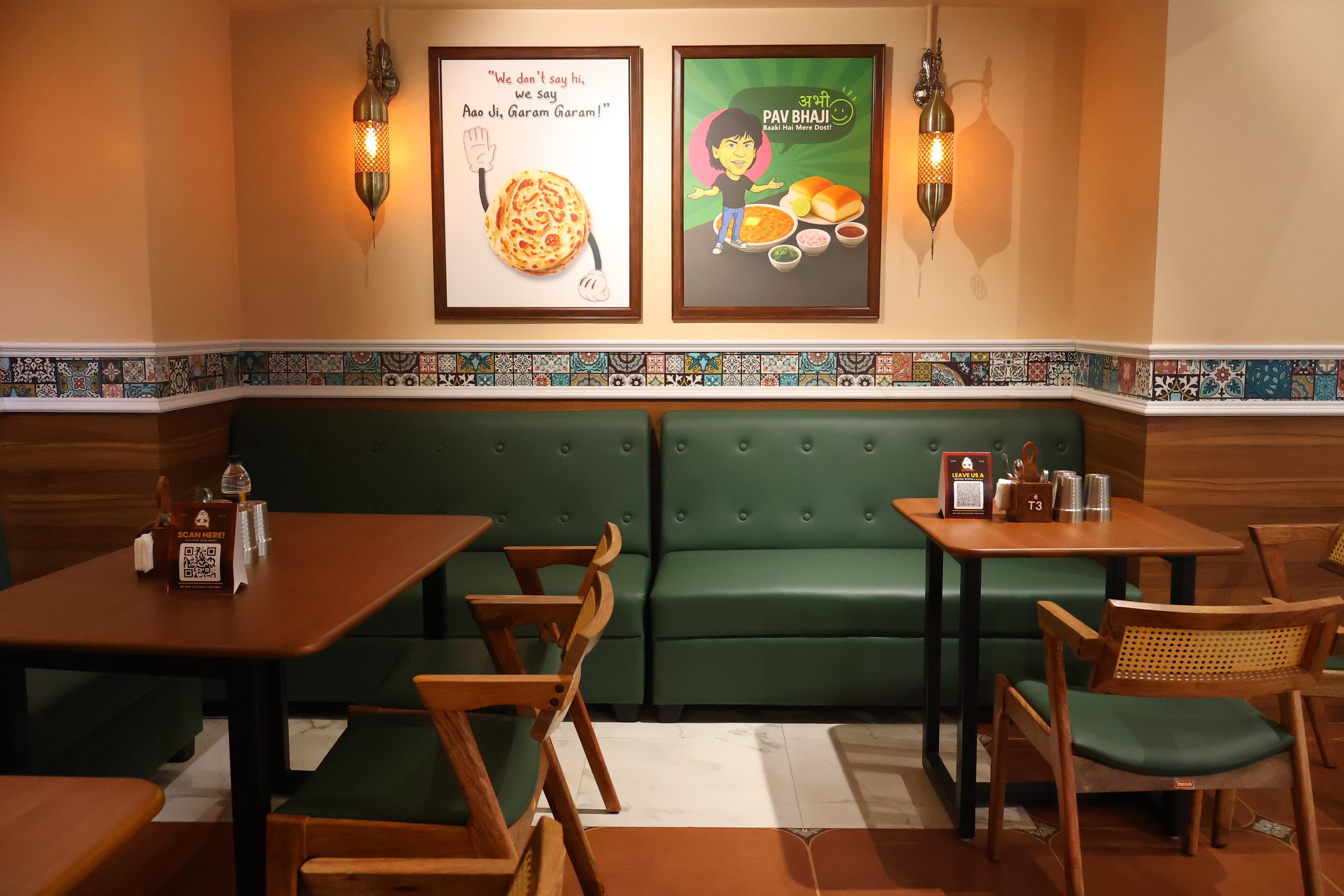 Meenu Amma — booth seating and tiled interior
